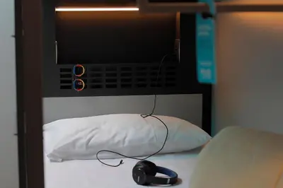 Letto o letti in una camera di Plus Florence