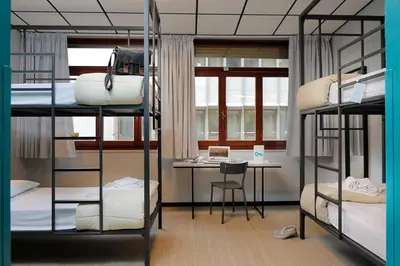 Letto o letti in una camera di Plus Florence