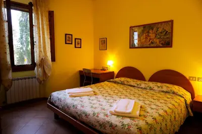 Letto o letti in una camera di Agriturismo Villa Guarnaschelli