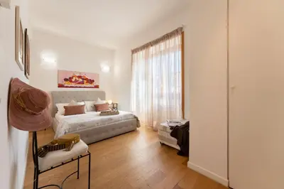 Letto o letti in una camera di Santa Maria Novella - Flo Apartments