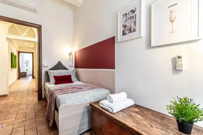 Letto o letti in una camera di Wine Apartments Florence Ansonica
