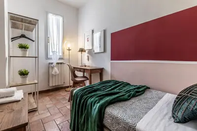 Letto o letti in una camera di Wine Apartments Florence Ansonica