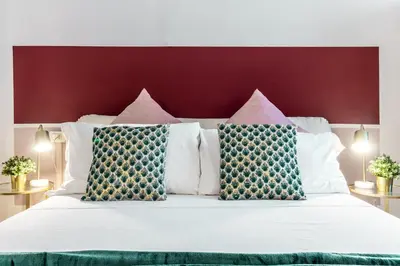 Letto o letti in una camera di Wine Apartments Florence Ansonica