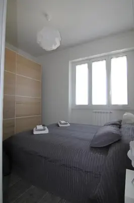 Letto o letti in una camera di Appartamento Zona Torregalli_Nuvola Rossa