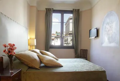 Letto o letti in una camera di B&B A Florence View