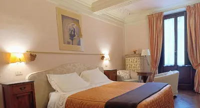 Letto o letti in una camera di B&B A Florence View