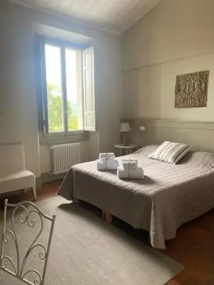Letto o letti in una camera di Sosta al Capitano