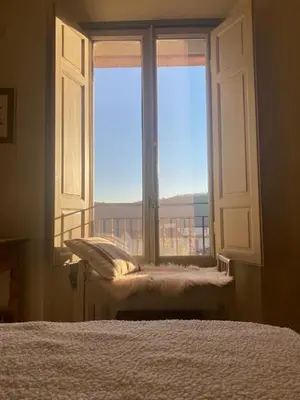 Letto o letti in una camera di Sosta al Capitano