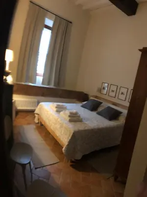 Letto o letti in una camera di Sosta al Capitano