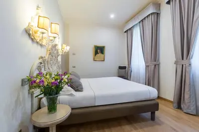 Letto o letti in una camera di Hotel Art Atelier - Place of Charme