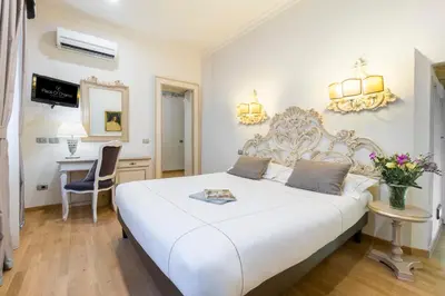 Letto o letti in una camera di Hotel Art Atelier - Place of Charme