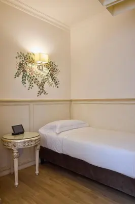 Letto o letti in una camera di Hotel Art Atelier - Place of Charme
