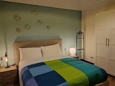 Letto o letti in una camera di Palazzo Guasti Appartamento Guido