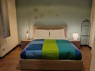 Letto o letti in una camera di Palazzo Guasti Appartamento Guido