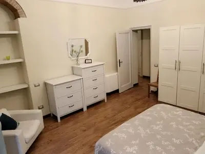 Letto o letti in una camera di Palazzo Guasti Appartamento Guido