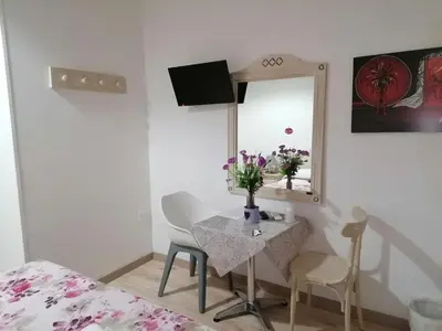 TV o dispositivi per l'intrattenimento presso Cicerone Guest House