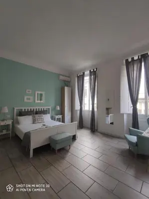 Letto o letti in una camera di Lost In Florence