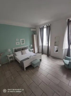 Letto o letti in una camera di Lost In Florence