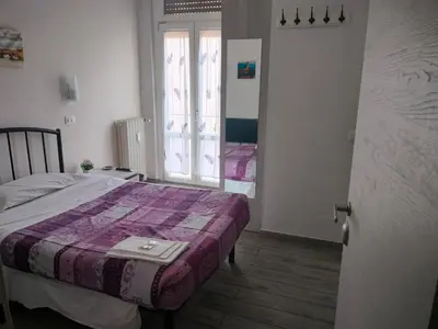 Letto o letti in una camera di Il Grillo Di Firenze B&B