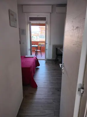 Letto o letti in una camera di Il Grillo Di Firenze B&B