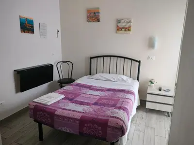 Letto o letti in una camera di Il Grillo Di Firenze B&B