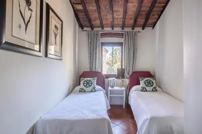Letto o letti in una camera di Giuliani Home
