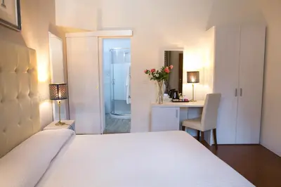 Letto o letti in una camera di Giuliani Home