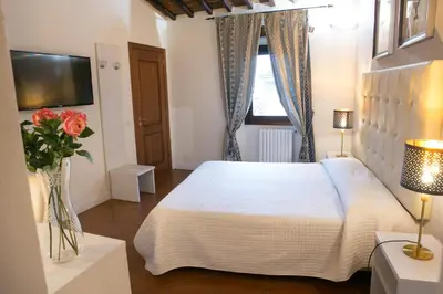Letto o letti in una camera di Giuliani Home
