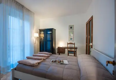 Letto o letti in una camera di La Galerie Luxury Apartment by Mamo Florence