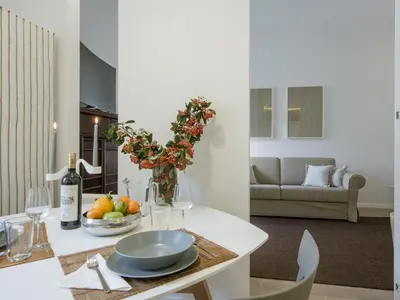 Area soggiorno di San Firenze Luxury Apartment by Mamo Florence