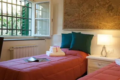 Letto o letti in una camera di Atelier del Sarto Apartment by Mamo Florence