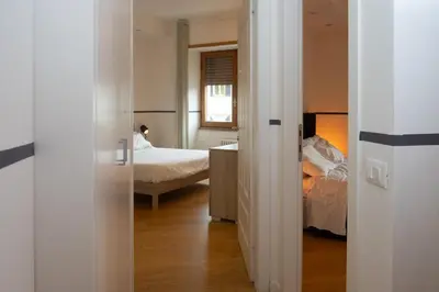 Letto o letti in una camera di One Step Florence