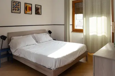 Letto o letti in una camera di One Step Florence