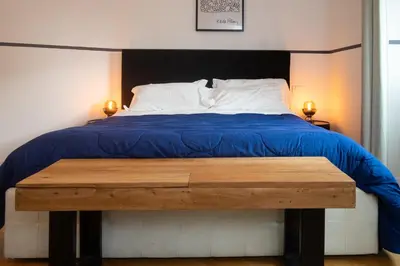 Letto o letti in una camera di One Step Florence