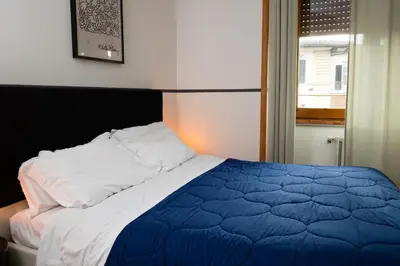 Letto o letti in una camera di One Step Florence