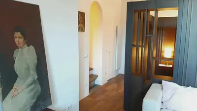 Letto o letti in una camera di Palazzo Larioni dei Bardi