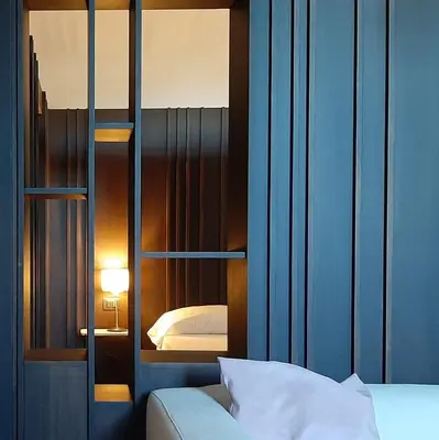 Letto o letti in una camera di Palazzo Larioni dei Bardi