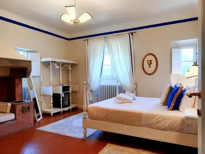 Letto o letti in una camera di Villa Nardi - Residenza D'Epoca