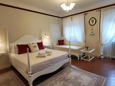 Letto o letti in una camera di Villa Nardi - Residenza D'Epoca