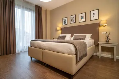 Letto o letti in una camera di Dedo Boutique Hotel