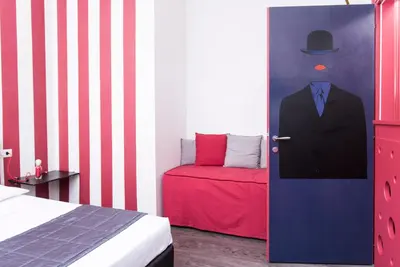 Letto o letti in una camera di Il Giglio Rosso B&B