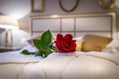 Letto o letti in una camera di Palazzo Ridolfi - Residenza d'Epoca