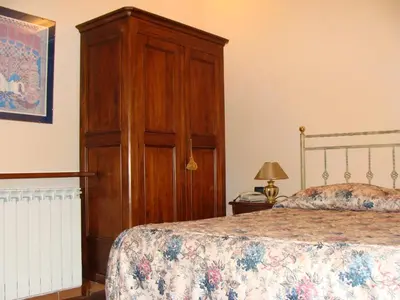 Letto o letti in una camera di Soggiorno Michelangelo