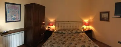 Letto o letti in una camera di Soggiorno Michelangelo