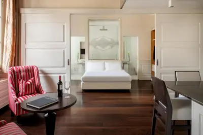 Letto o letti in una camera di Ricasoli Firenze Luxury Apartments | UNA Esperienze