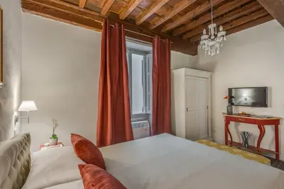 Letto o letti in una camera di Residenze d'epoca Collection-Sant'Anna