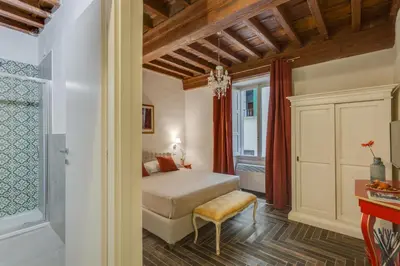 Letto o letti in una camera di Residenze d'epoca Collection-Sant'Anna