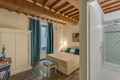 Letto o letti in una camera di Residenze d'epoca Collection-Sant'Anna