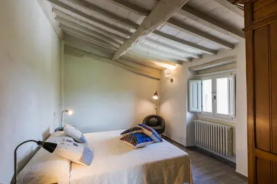Letto o letti in una camera di San Casciano - Appartamenti Podere Ianni