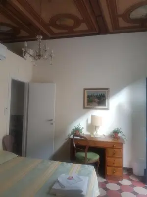 Letto o letti in una camera di Soggiorno Sogna Firenze